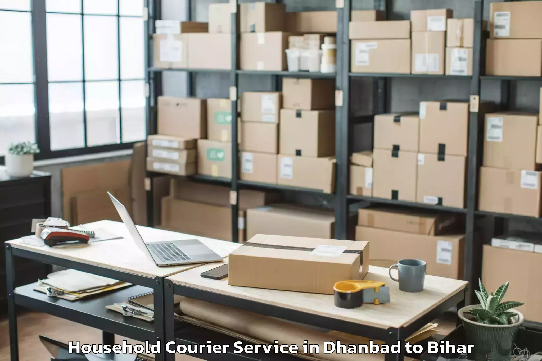 Dhanbad to Rajaun Household Courier